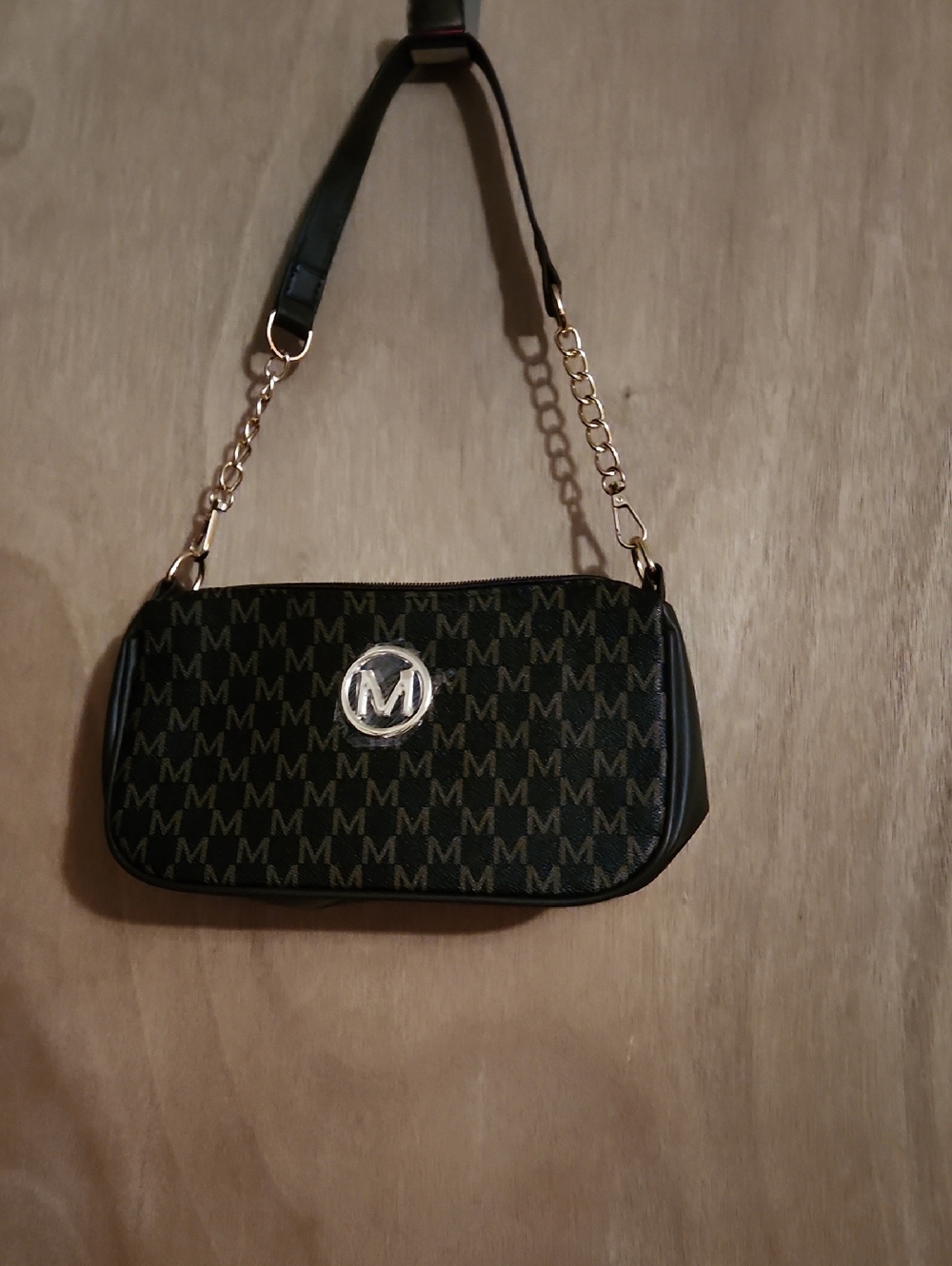 Monogram 'M' Black Shoulder Bag with Gold Chain Accent